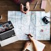Holiday planning atop an unfolded map